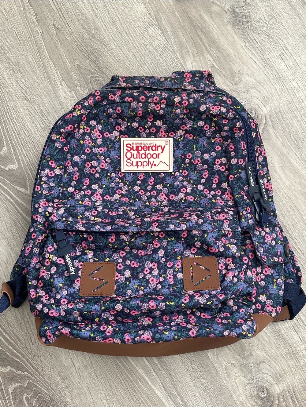 Superdry Navy Floral Backpack with Pink and Green Accents